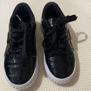 Patent Puma. Adult size 7 1/2 or Kids 6